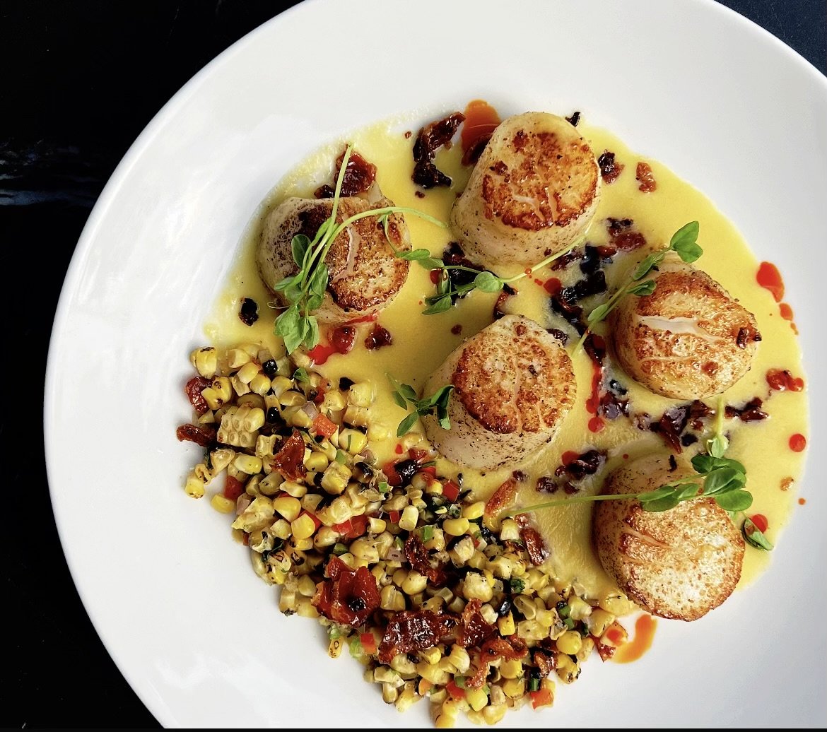 Golden seared scallops with corn